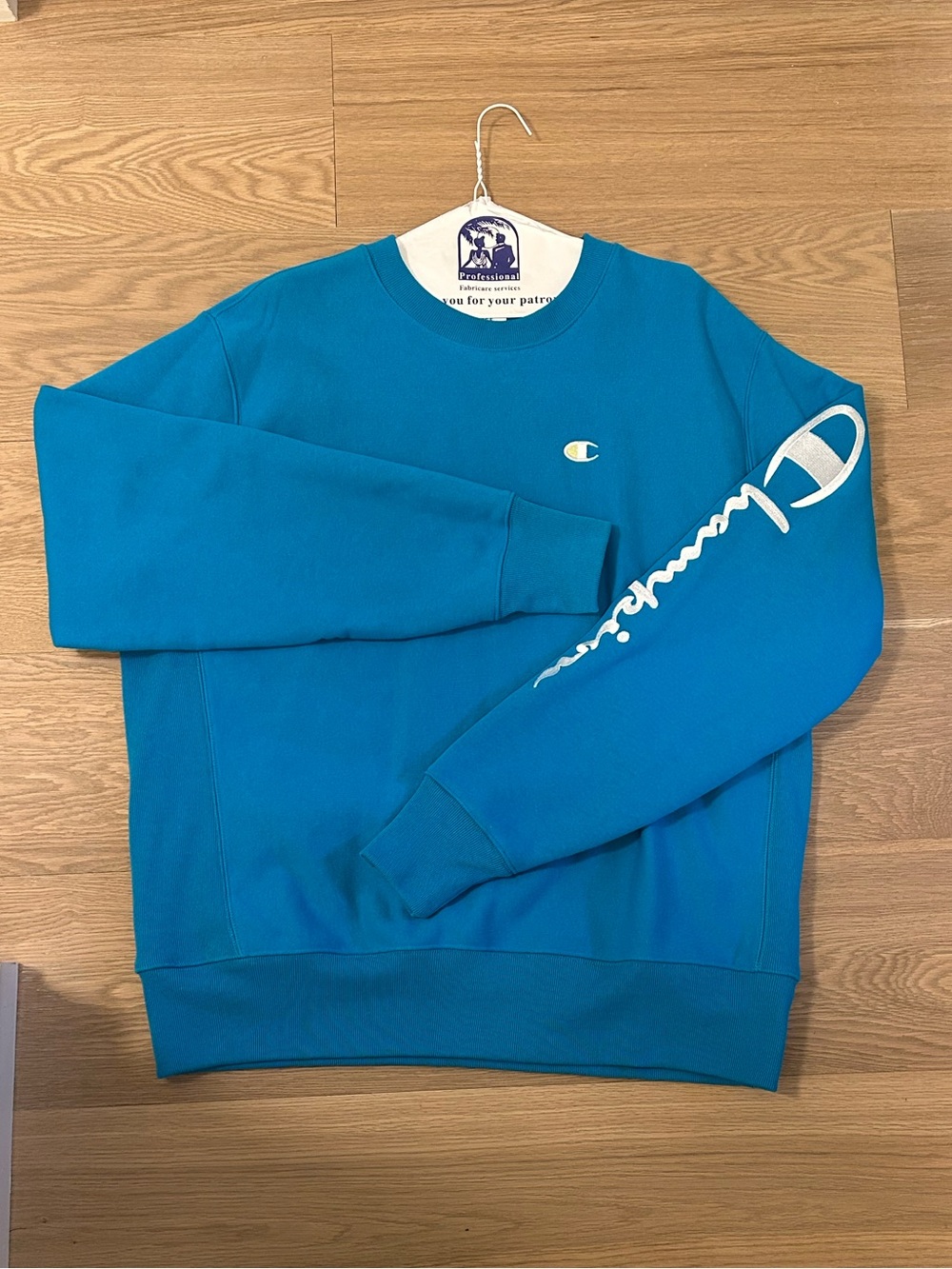 Champion Men’s Teal Crewneck Sweatshirt with White Sleeve Script